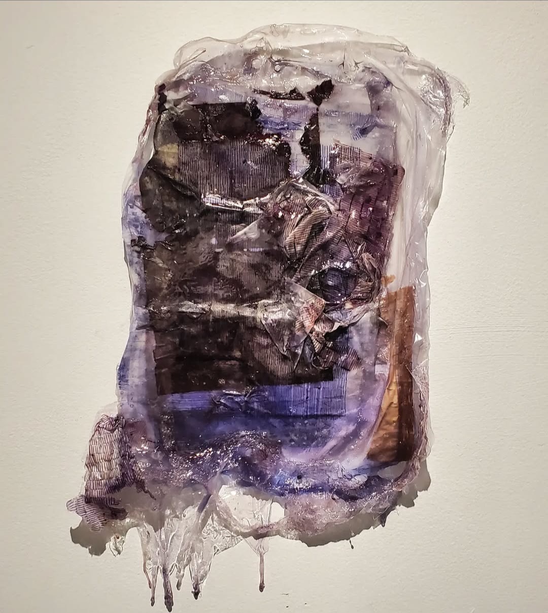 Abstract mixed media artwork with dark purple, black, and brown tones on a light background.